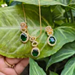 Emerald pendant set with chain