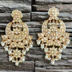 Kundan earrings with white stone